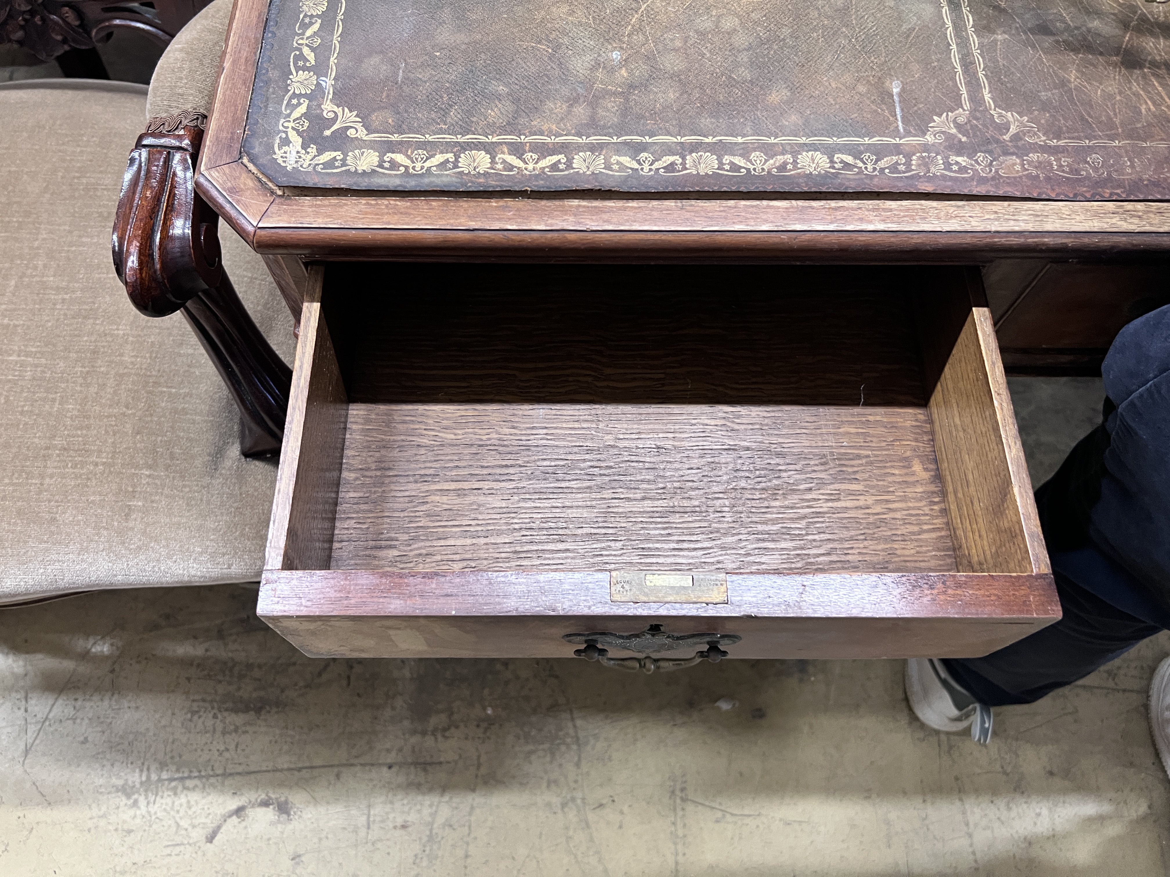 A walnut pedestal desk, width 153cm, height 91cm